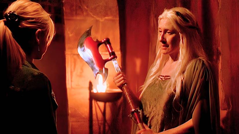 The Last Guardian presents the Scythe to Buffy in Buffy the Vampire Slayer Season 7
