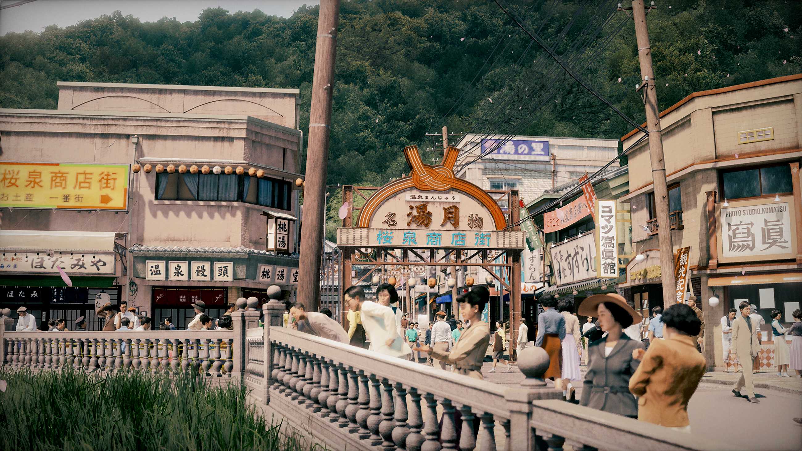 Pedestrians explore a bustling shopping street in 1951 Atami, Japan, with traditional storefronts and a decorative entrance arch in Stranger Than Heaven