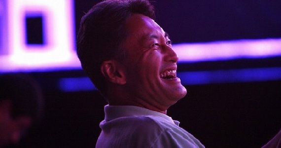Kazuo Hirai laughing