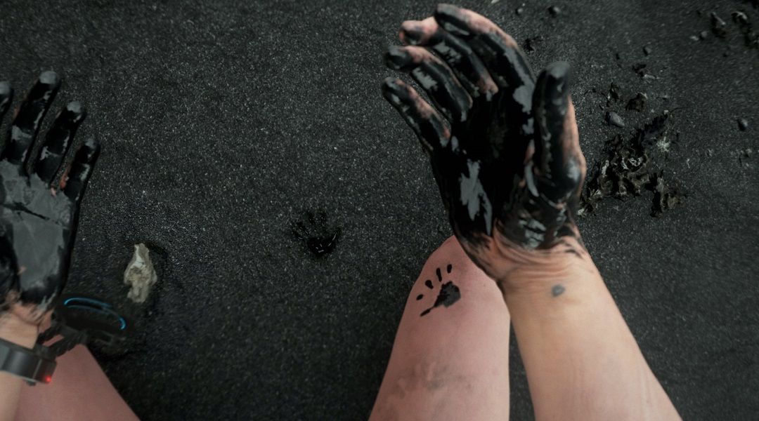 Death Stranding: Do the Dog Tags Hint At A Black Hole? - Black handprints
