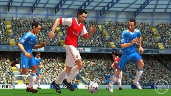 Robin van Persie makes his way through the D in FIFA 11 on Wii.