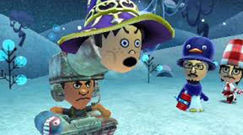 A Mii of Reggie Fils-Aime in the Tank job loads a Mii of Shigeru Miyamoto in the Mage job into his barrel to use for the Human Cannonball attack