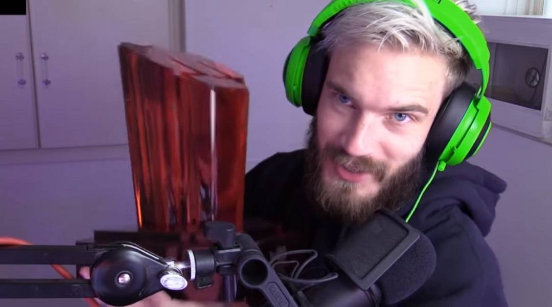 PewDiePie Almost Uses Racist Language Again Just Days After Apology - PewDiePie with trophy