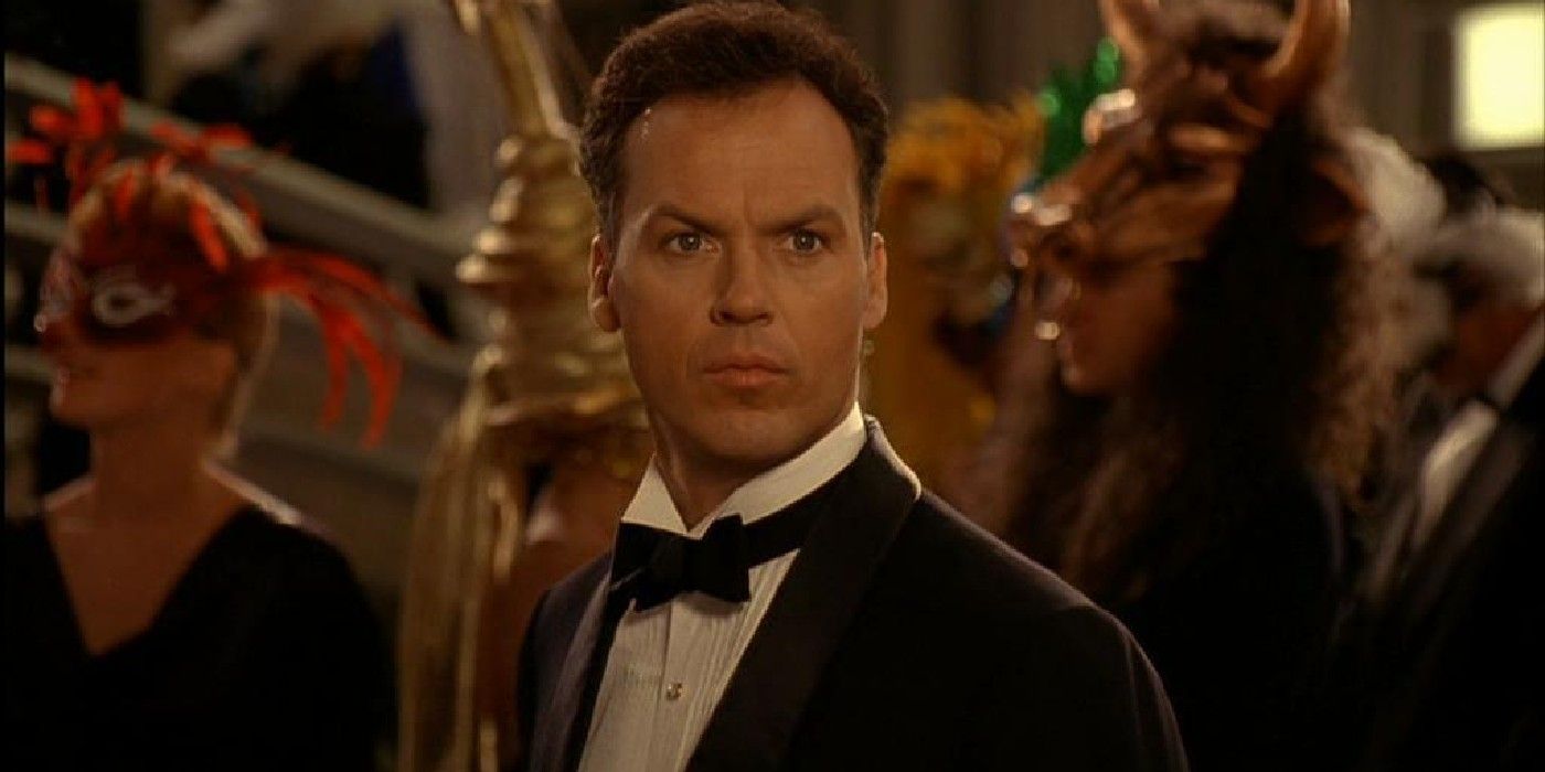 batman-returns-michael-keaton-as-bruce-wayne-looking-at-selina-at-the-masquerade-ball.jpg
