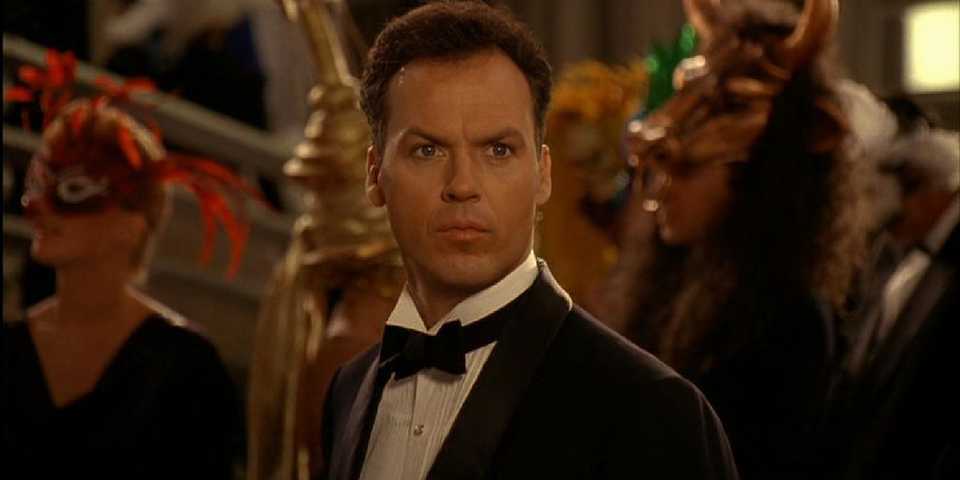 batman-returns-michael-keaton-as-bruce-wayne-looking-at-selina-at-the-masquerade-ball.jpg