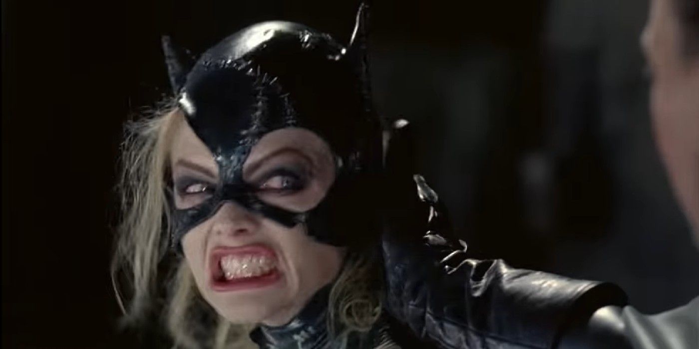 batman-returns-michelle-pfeiffer-as-catwoman-snarling-at-batman-as-he-holds-his-hand-to-her-face.jpg