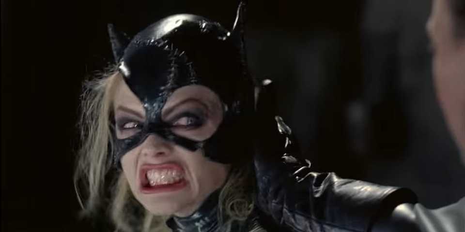 batman-returns-michelle-pfeiffer-as-catwoman-snarling-at-batman-as-he-holds-his-hand-to-her-face.jpg