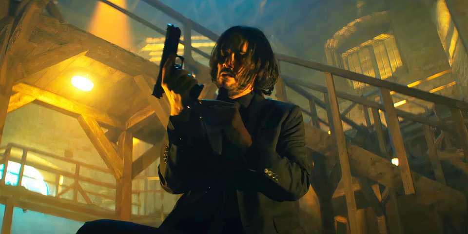 keanu-reeves-reloading-a-pistol-as-john-wick-in-ballerina.jpg