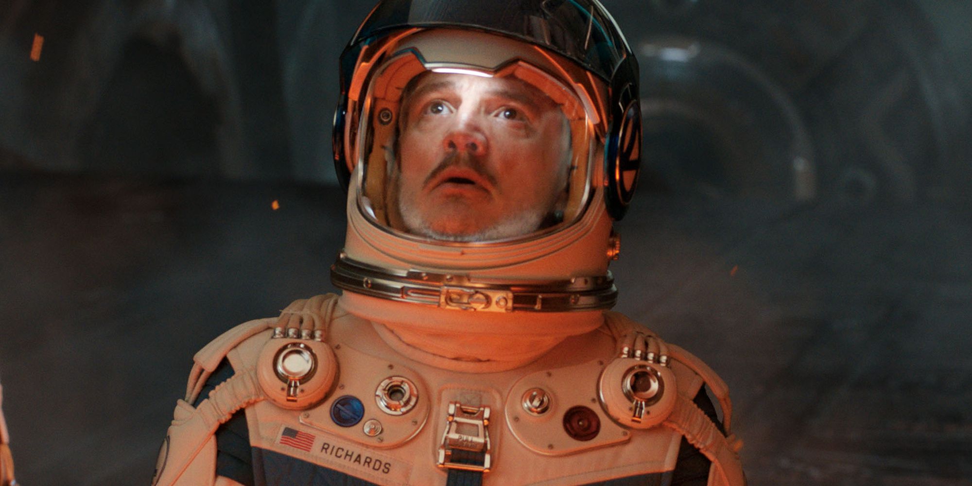 pedro-pascal-s-reed-richards-looking-scared-in-a-space-suit-in-the-fantastic-four-first-steps-as-he-looks-up.jpg