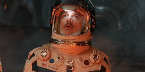 pedro-pascal-s-reed-richards-looking-scared-in-a-space-suit-in-the-fantastic-four-first-steps-as-he-looks-up.jpg