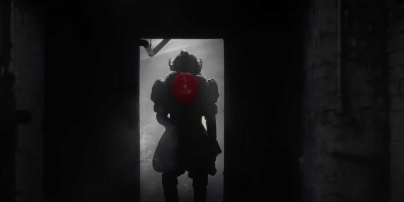 pennywise-holds-up-a-red-balloon-in-the-sewers-from-it-welcome-to-derry-trailer.jpg