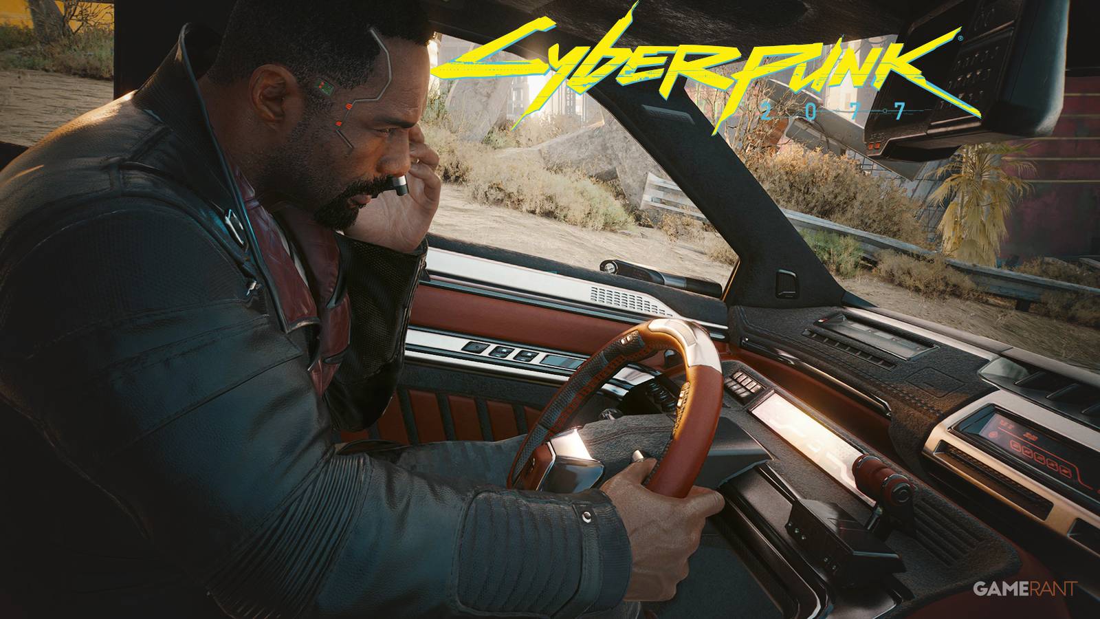 Cyberpunk 2077 Phantom Liberty Idris Elba as Solomon Reed talking on phone while driving next to game logo