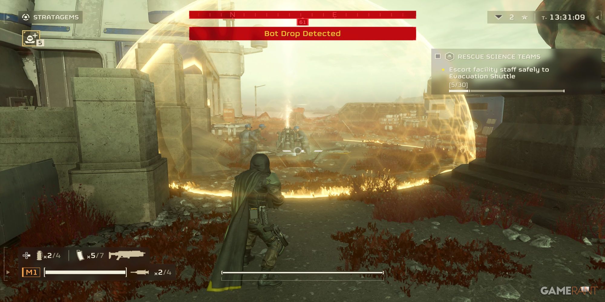 A player stands in front of a Shield Generator Relay