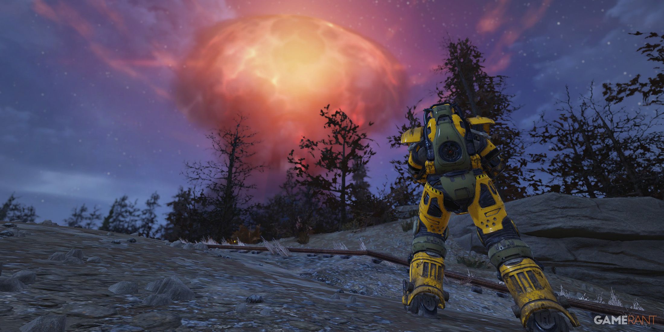 Fallout 76 running toward nuke detonation in yellow Power Armor screenshot