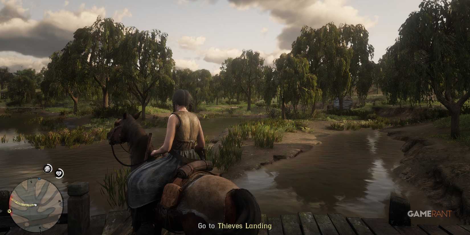 Riding a horse on a bridge over a swamp