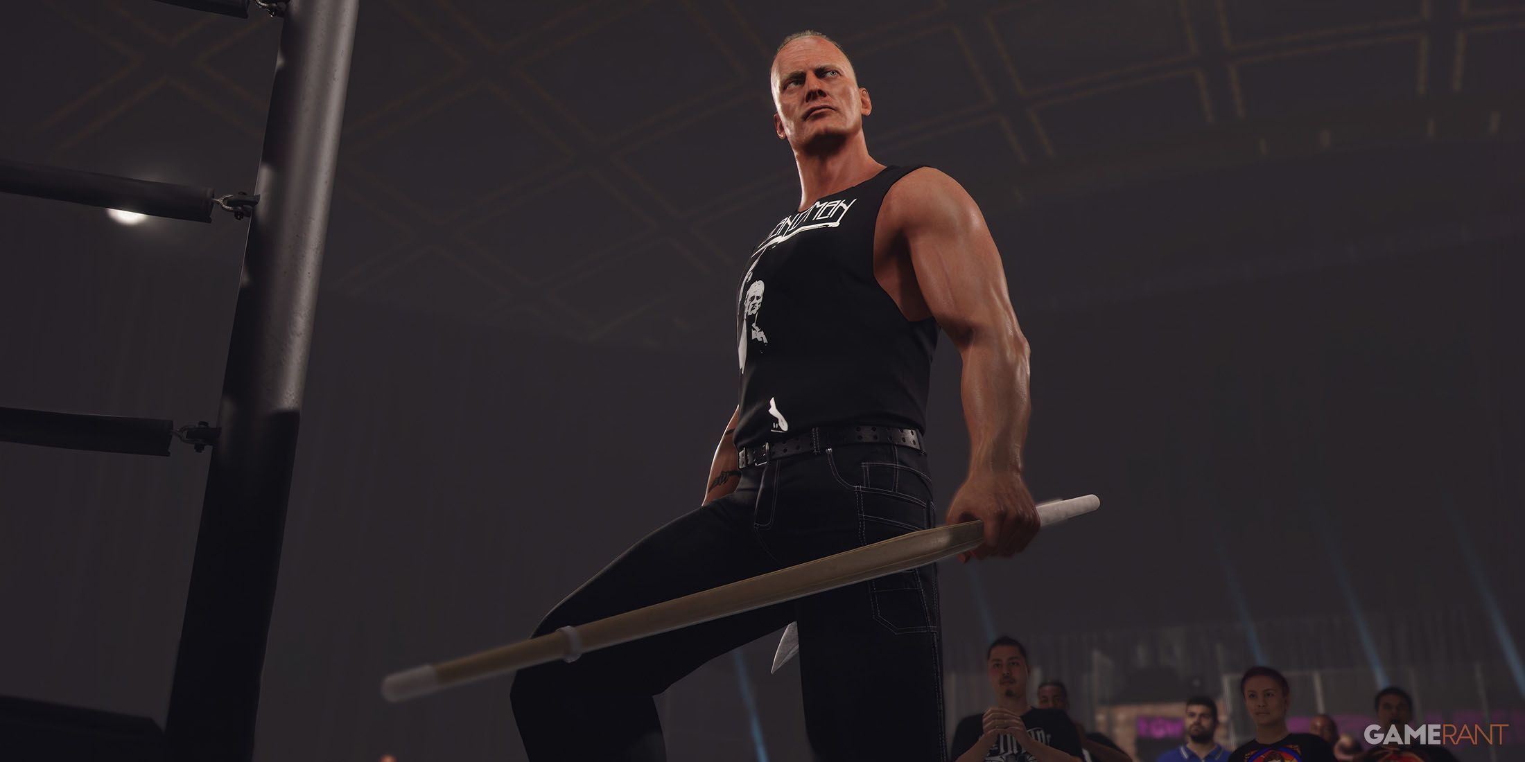 A screenshot of the Sandman entering the ring with a kendo stick in his hand in WWE 2K24.