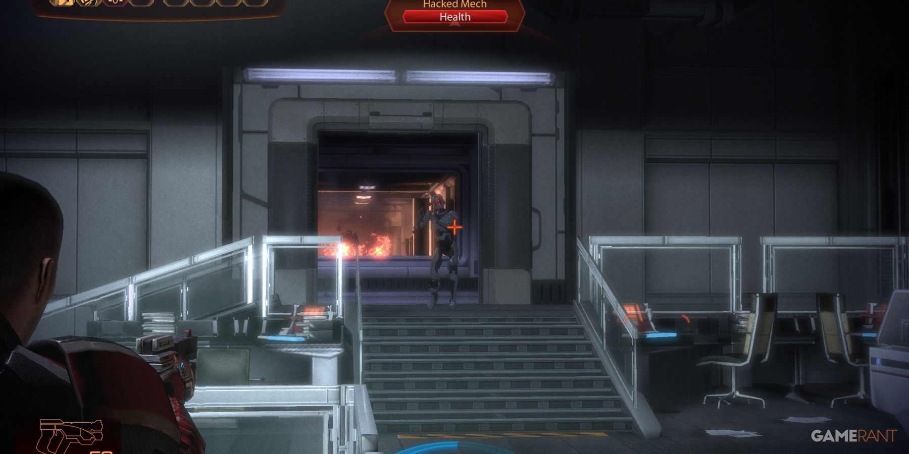 Commander Shepard fighting in Mass Effect 2