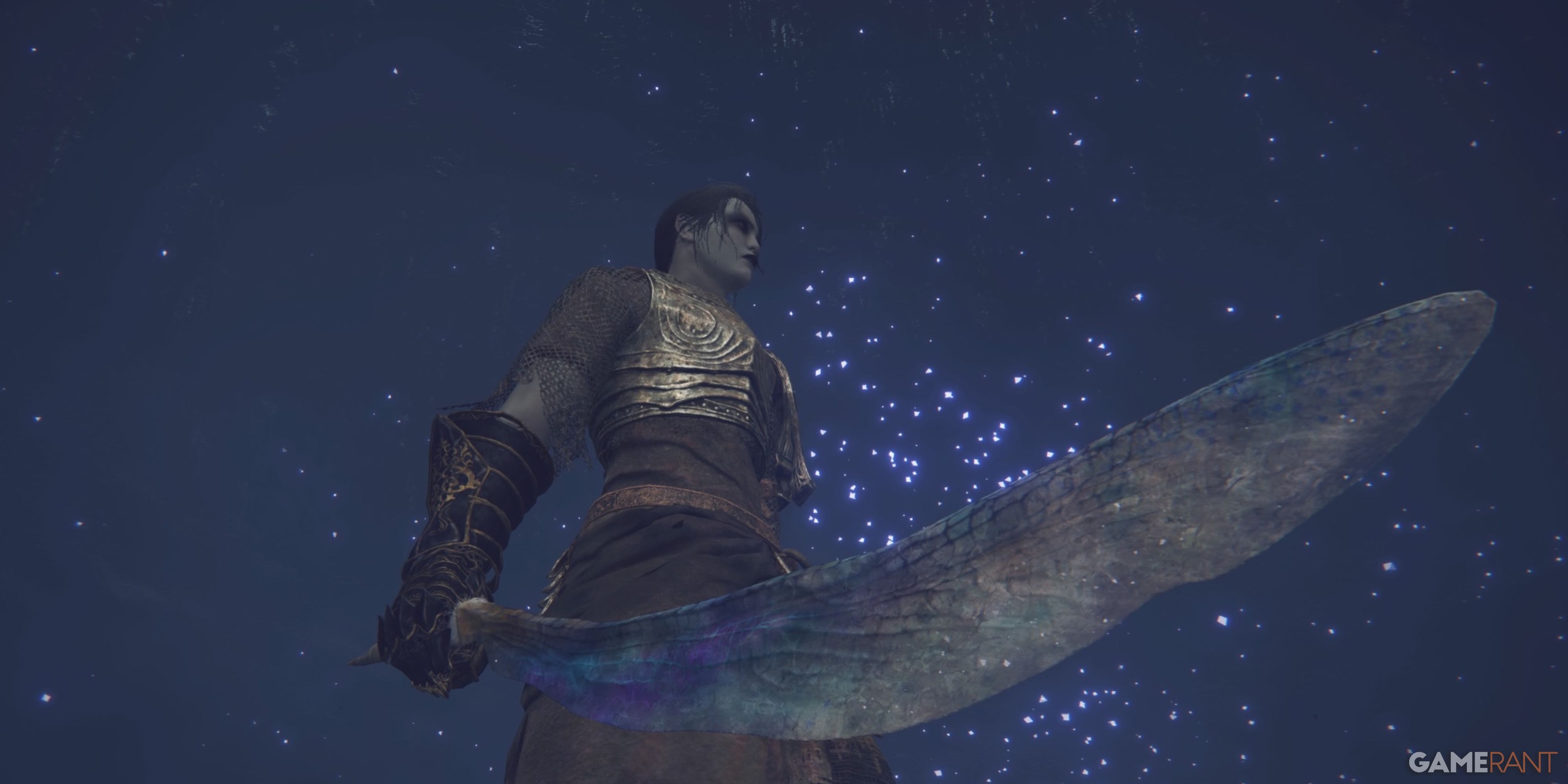 Elden Ring player holding the Wing of Astel with a ceiling looking like the night sky in the background