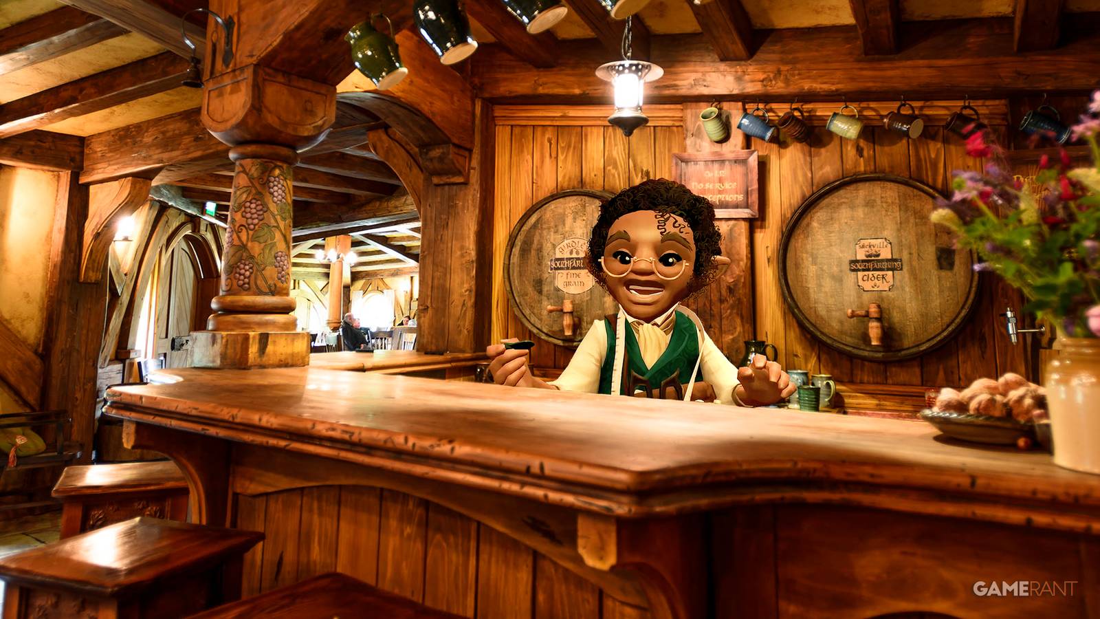 Tales of the Shire Hobbit behind the desk at the Green Dragon Inn