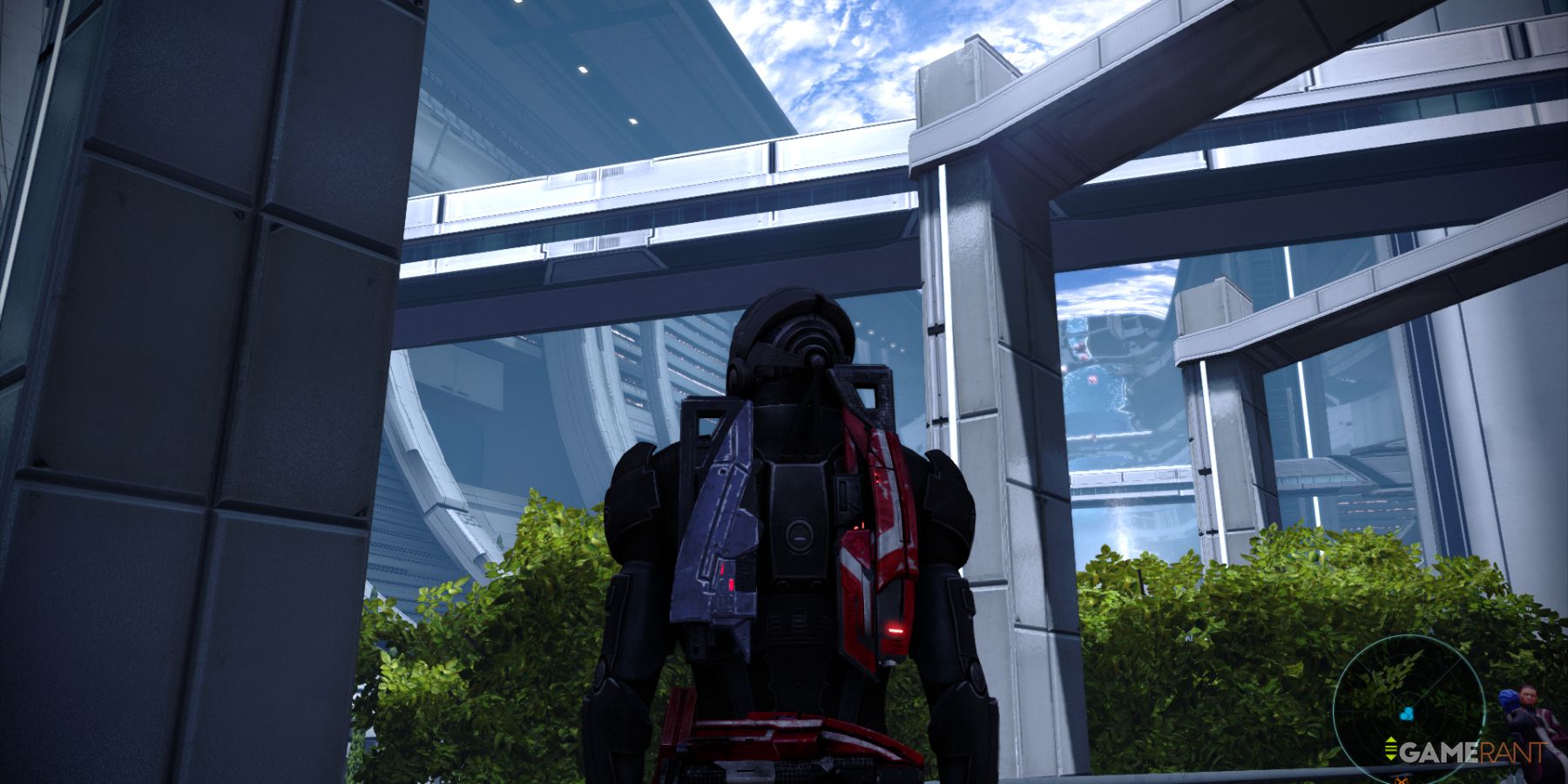 Shepard under modern architecture with greenery in The Citadel in Mass Effect 1