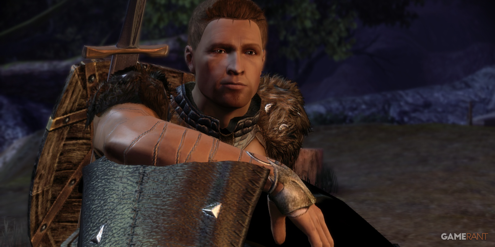 The Warden chats with Alistair after waking from a nightmare at camp in Dragon Age Origins