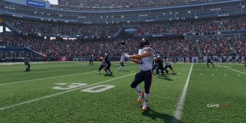 Bears TE making a crucial catch near the sideline against the Patriots in Madden NFL 25