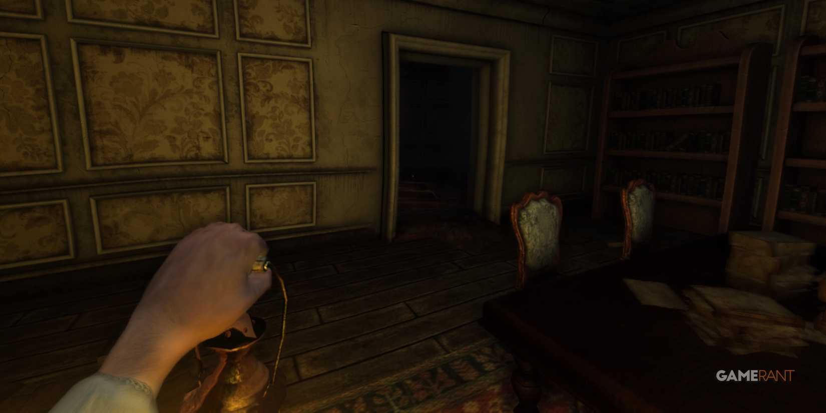 9 Horror Games That Make You Feel Defenseless Player searches a room with a lamp