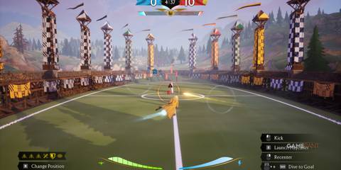 Keeper defending an attack on the Quidditch Champions field, with the match scoreboard active