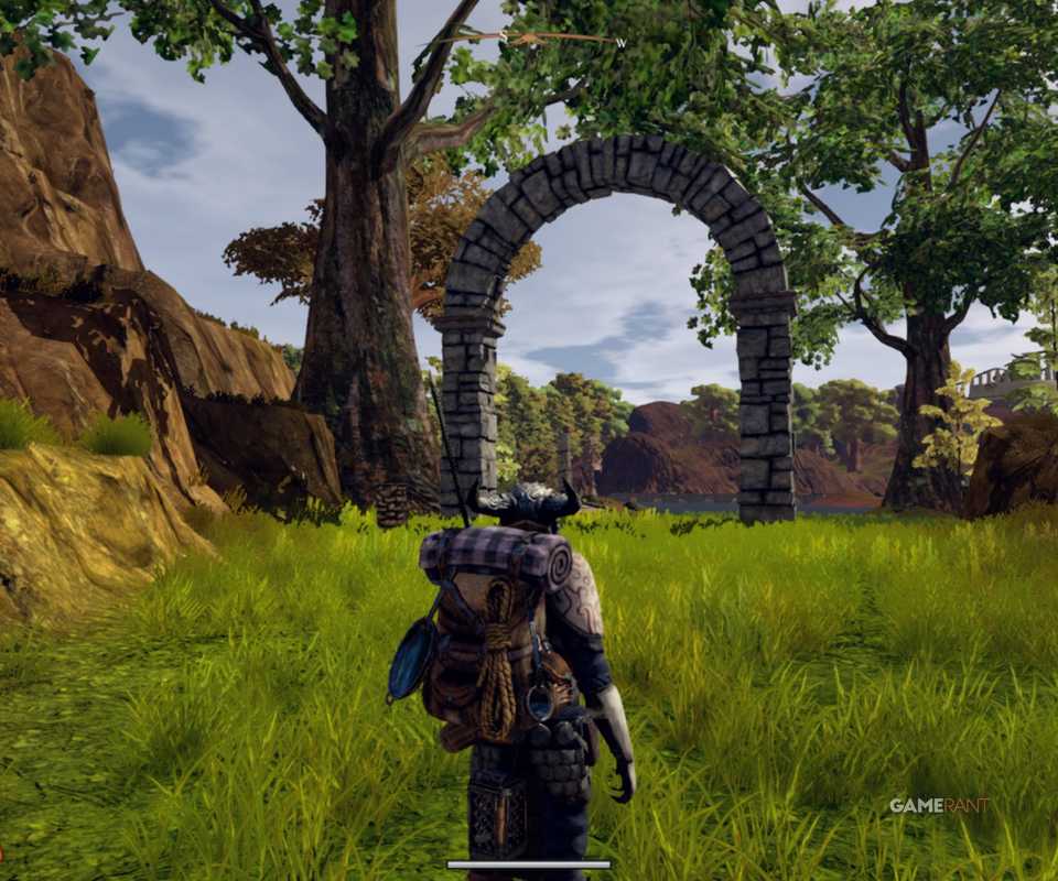 Outward player with big sword stands in grass near a stone arch