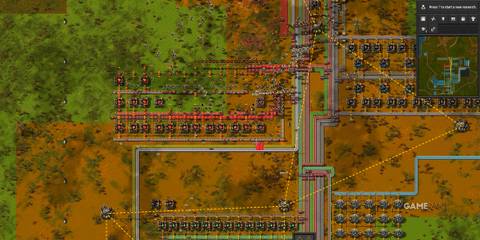 Robots dismantling a sub-factory in Factorio