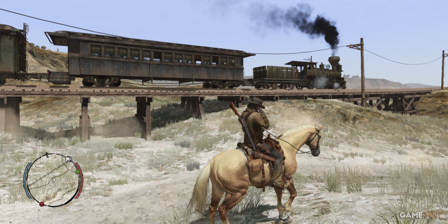 John Marston on horseback observing a moving train on a wooden bridge in Red Dead Redemption