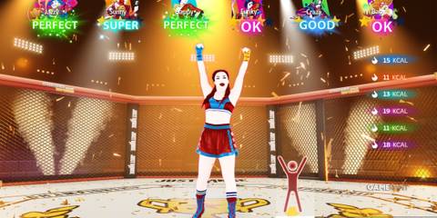a character from the video game Just Dance 2024 Edition is dancing inside of a fighting ring. 