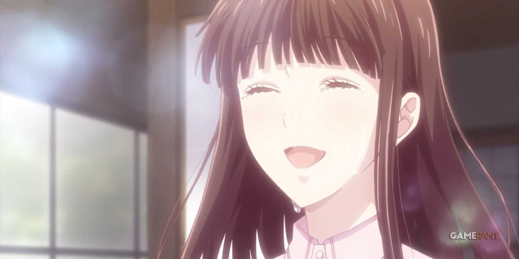 a close up of a female anime character with an happy face.