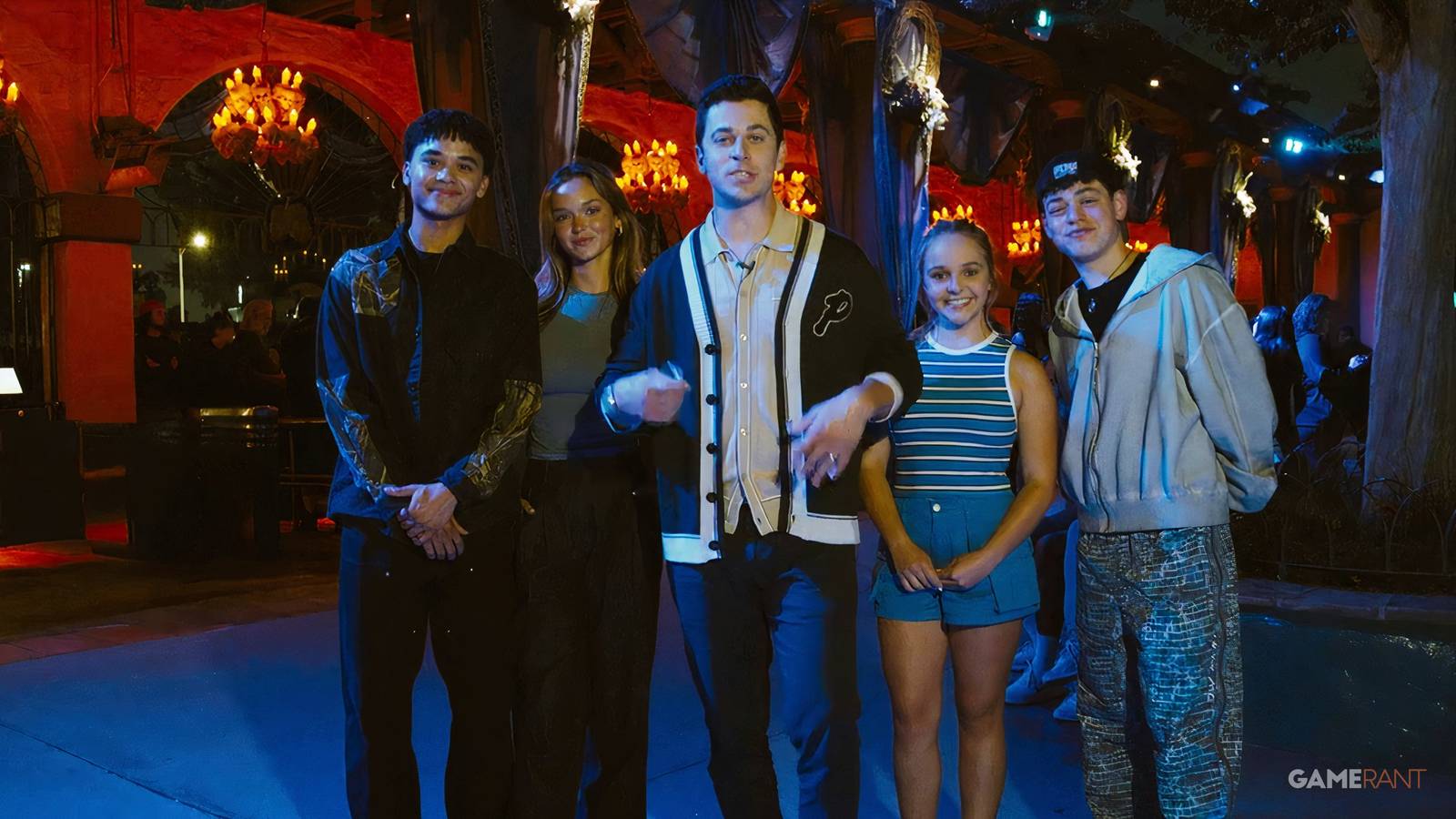 monster summer movie cast and director in front of knotts berry farm