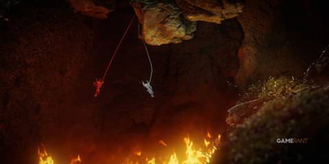 two yarns holding themselves in the air with fire flames on the floor. 