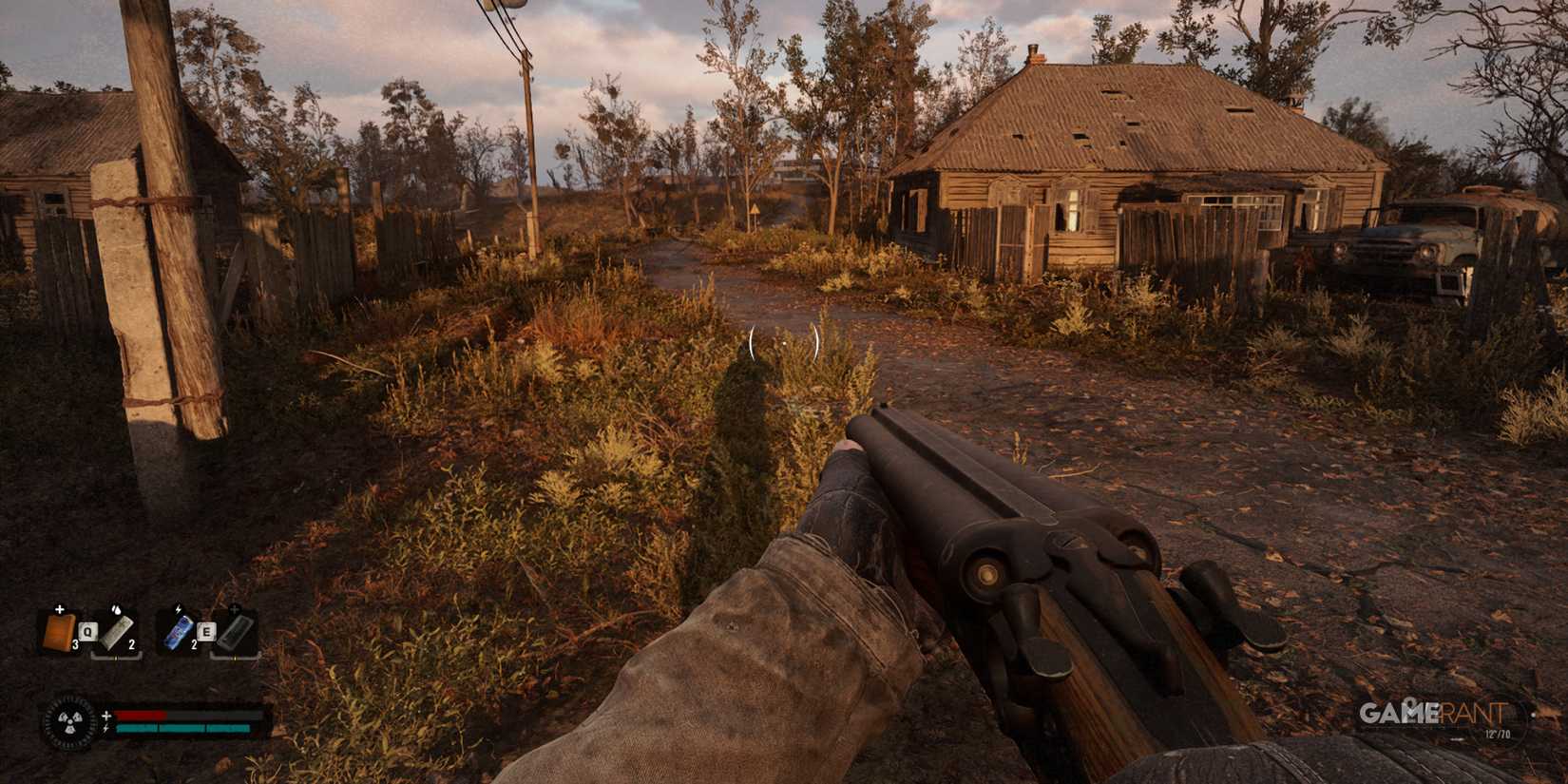 A post-apocalyptic rural road with abandoned wooden houses and a shotgun in hand in STALKER 2