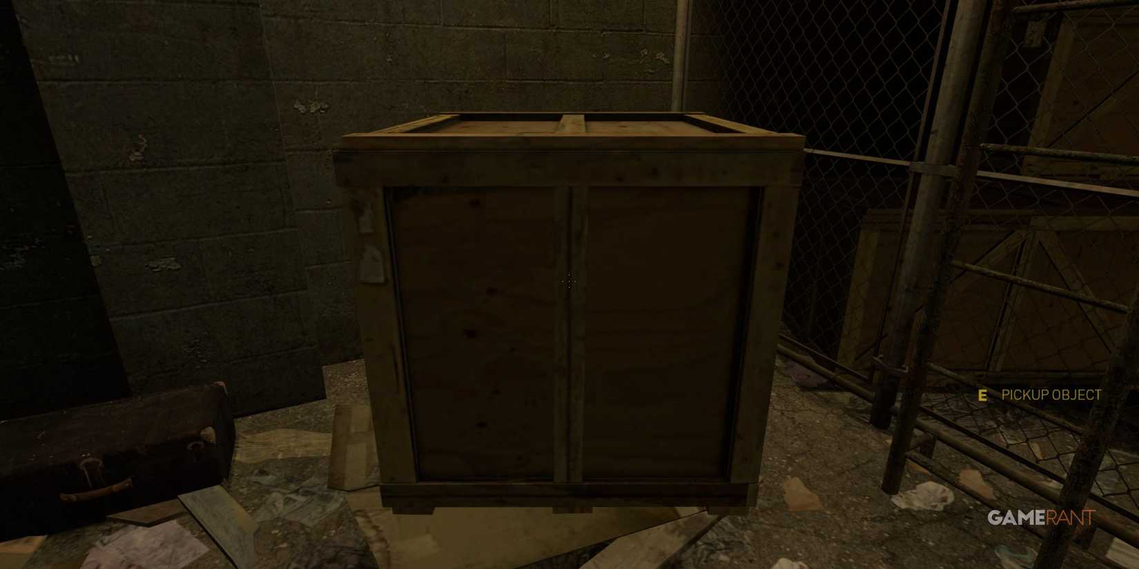 A wooden crate in a dimly lit storage area in Half-Life 2