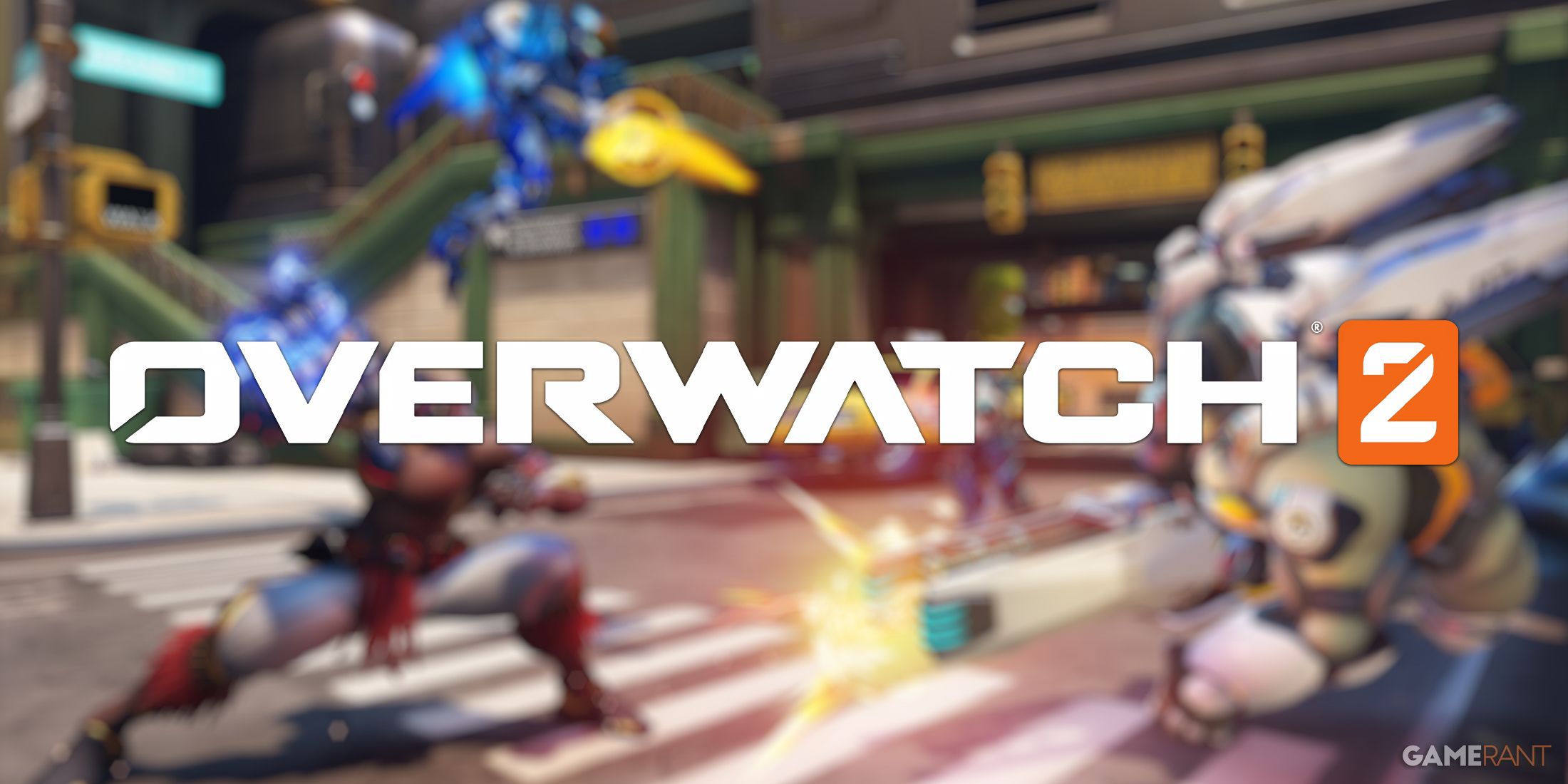 Overwatch 2 logo with screenshot of team fight in the background