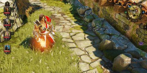 Character wielding a flaming sword on a stone pathway surrounded by greenery in Divinity Original Sin