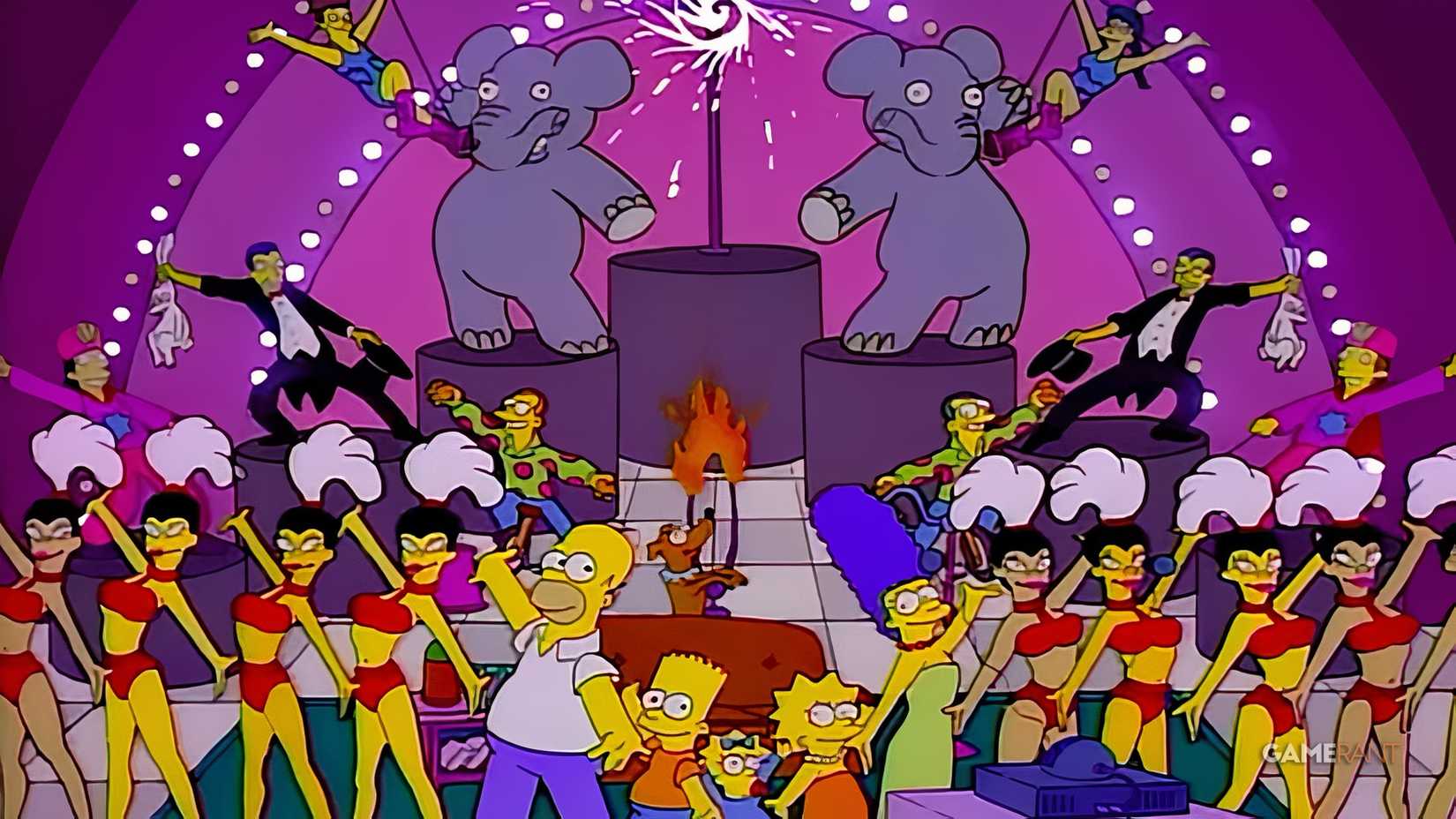 The Simpsons stand on a giant Las Vegas stage with their family sofa and a line of showgirls.
