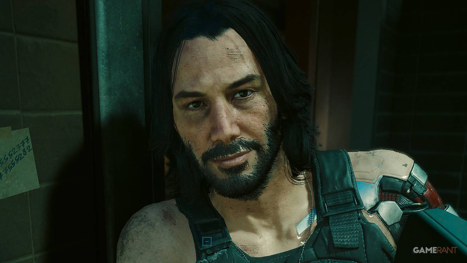 Cyberpunk 2077 Phantom Liberty Johnny Silverhand leaning on wall next to telephone close-up 2x1 crop