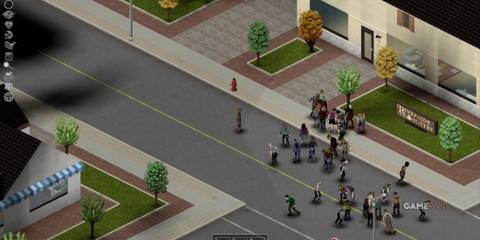 Streets filled with a zombie horde approaching the Riverside Suites in Project Zomboid