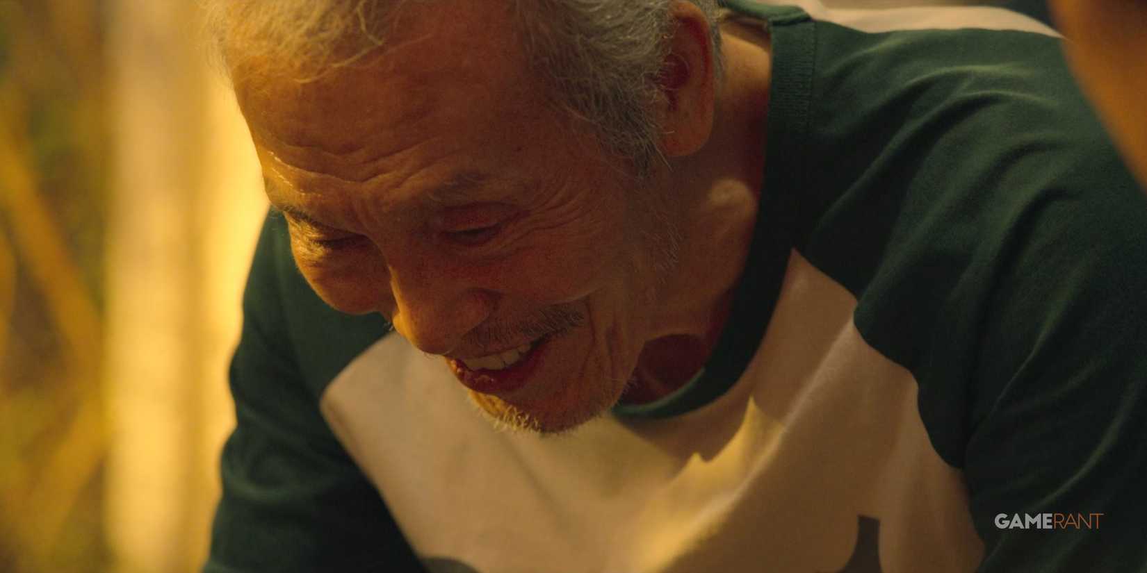 a close up on player 001 looking down on squid games season 1-1