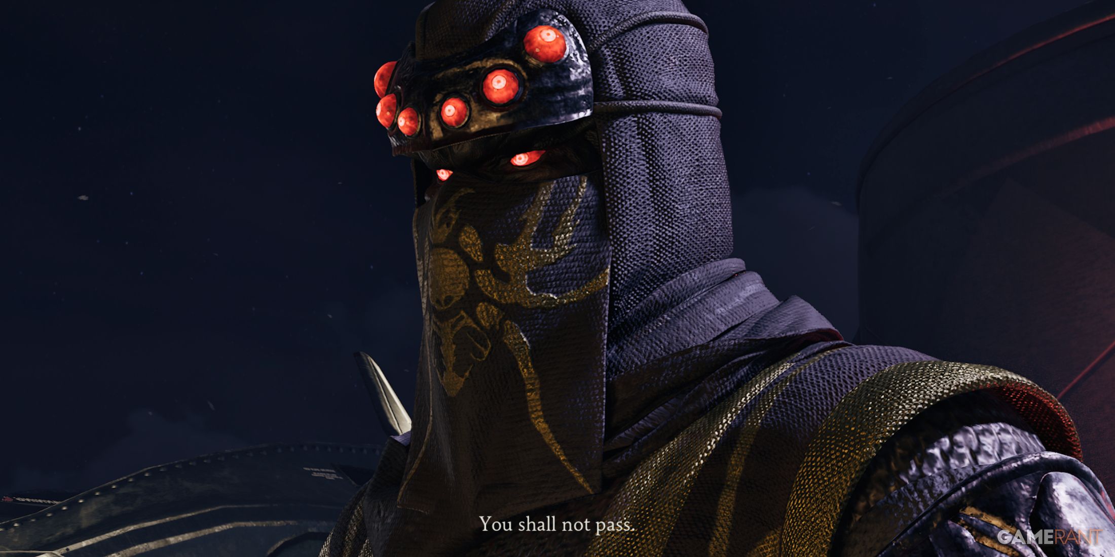 Close-up of a masked enemy saying You shall not pass in Ninja Gaiden 2 Black