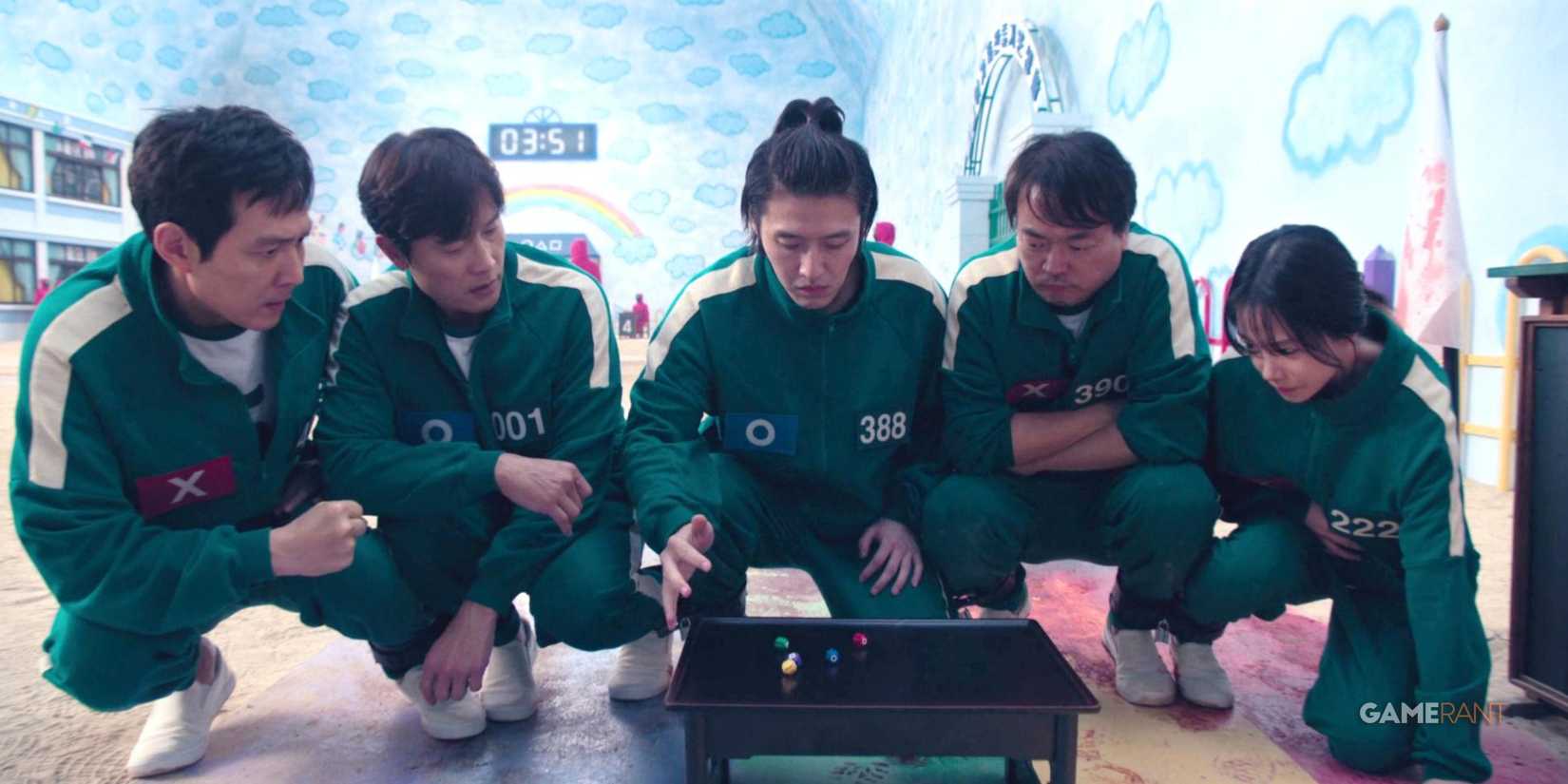 five people playing a kid's game-2