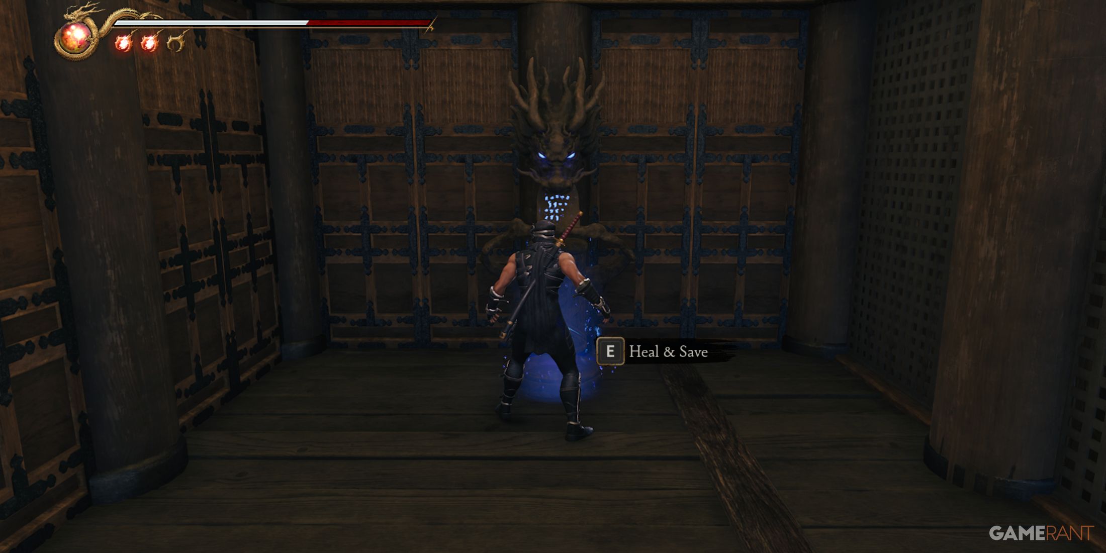 Healing and saving progress at a Dragon Statue in Ninja Gaiden 2 Black