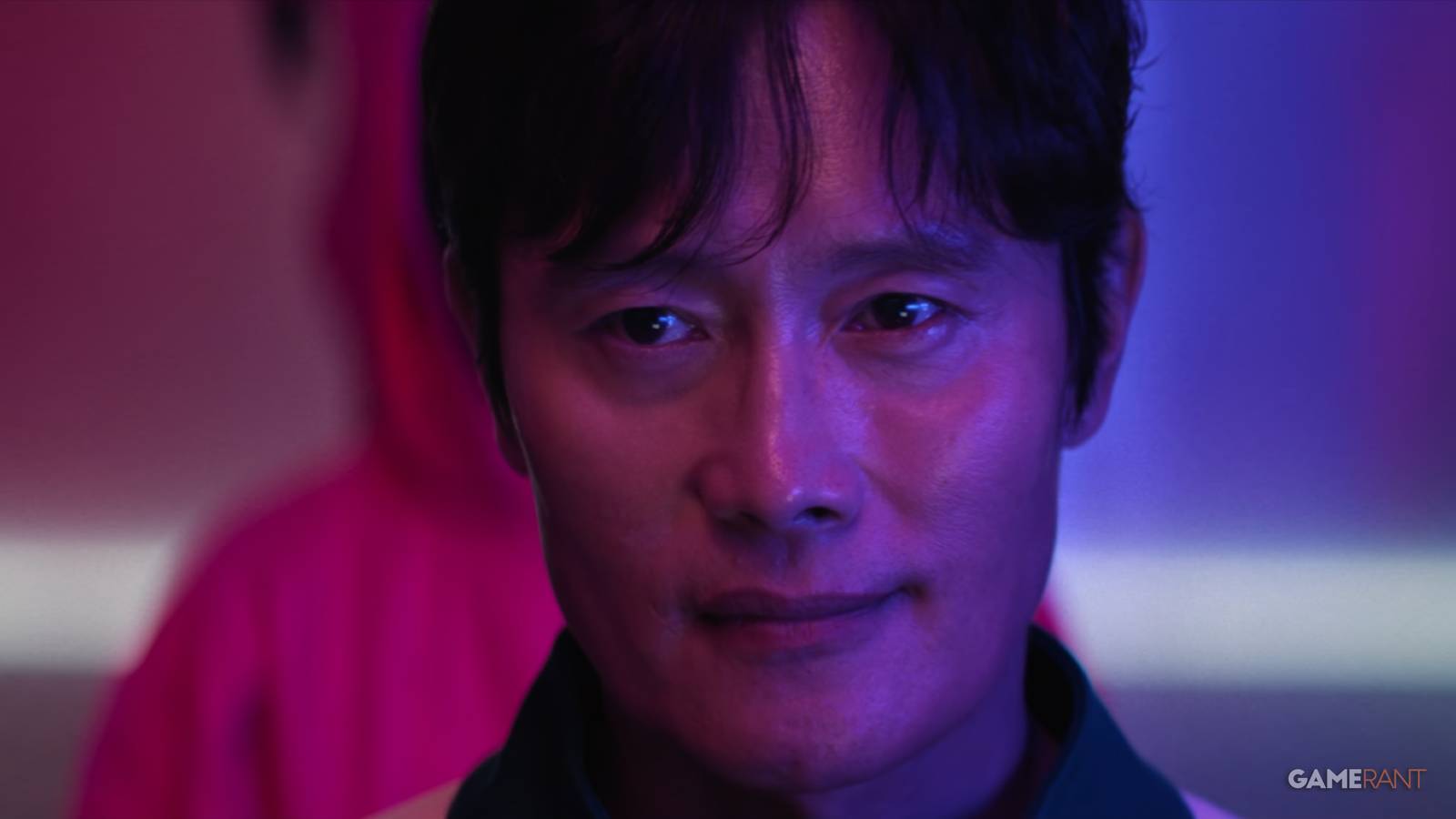 In-ho smirks after voting to continue the 2024 Squid Game in Squid Game.