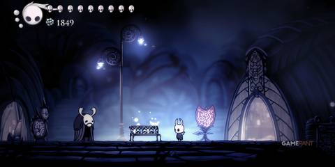Hollow Knight: 10 Tips To Make The Game Easier The Knight stands near a bench with Eldenbug