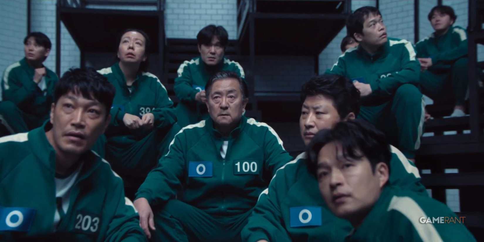 player 100 on squid game series surrounded with other players