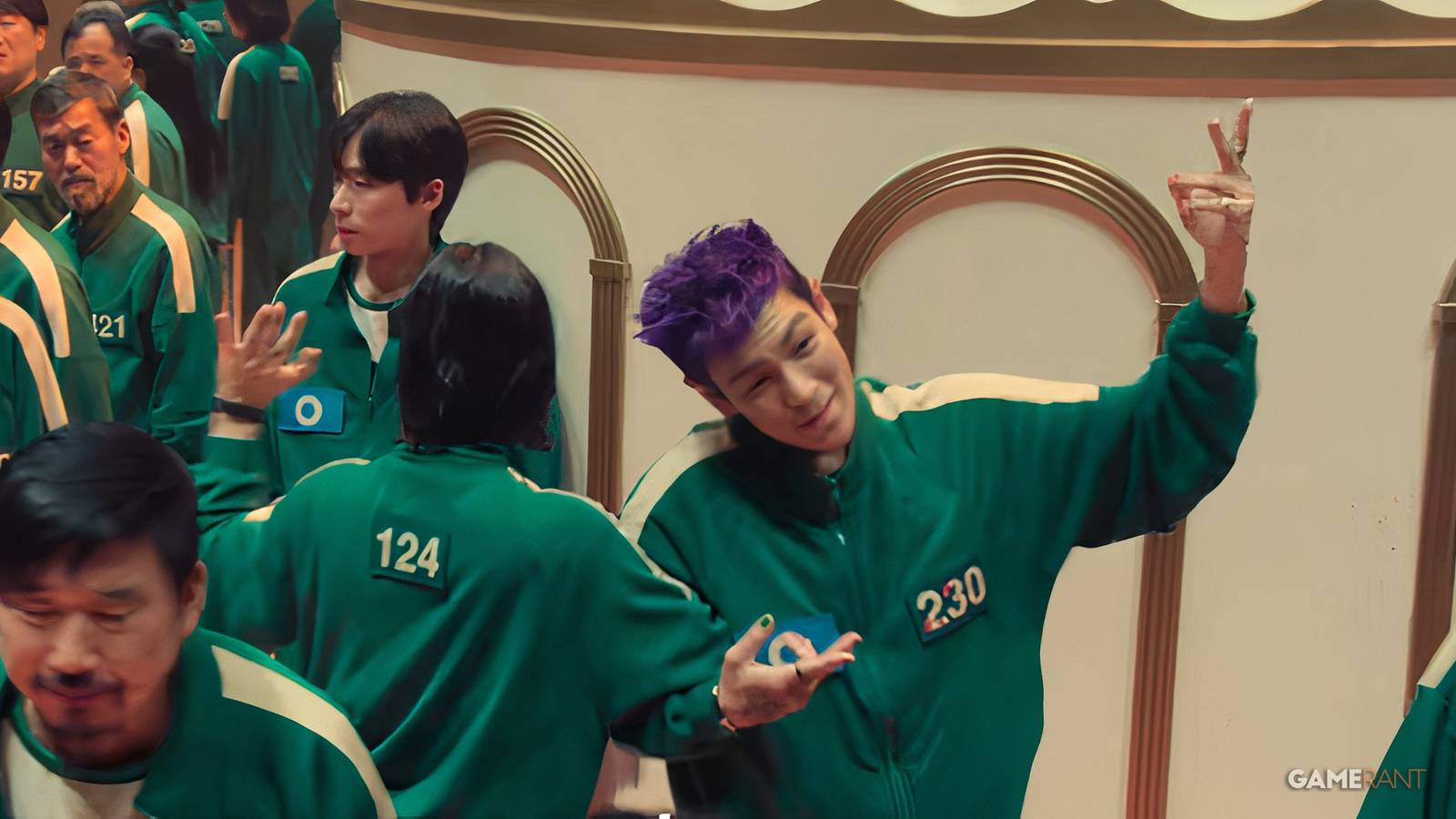 Thanos and Nam-gyu dance in circles while under the influence during the Mingle game in Squid Game 2.